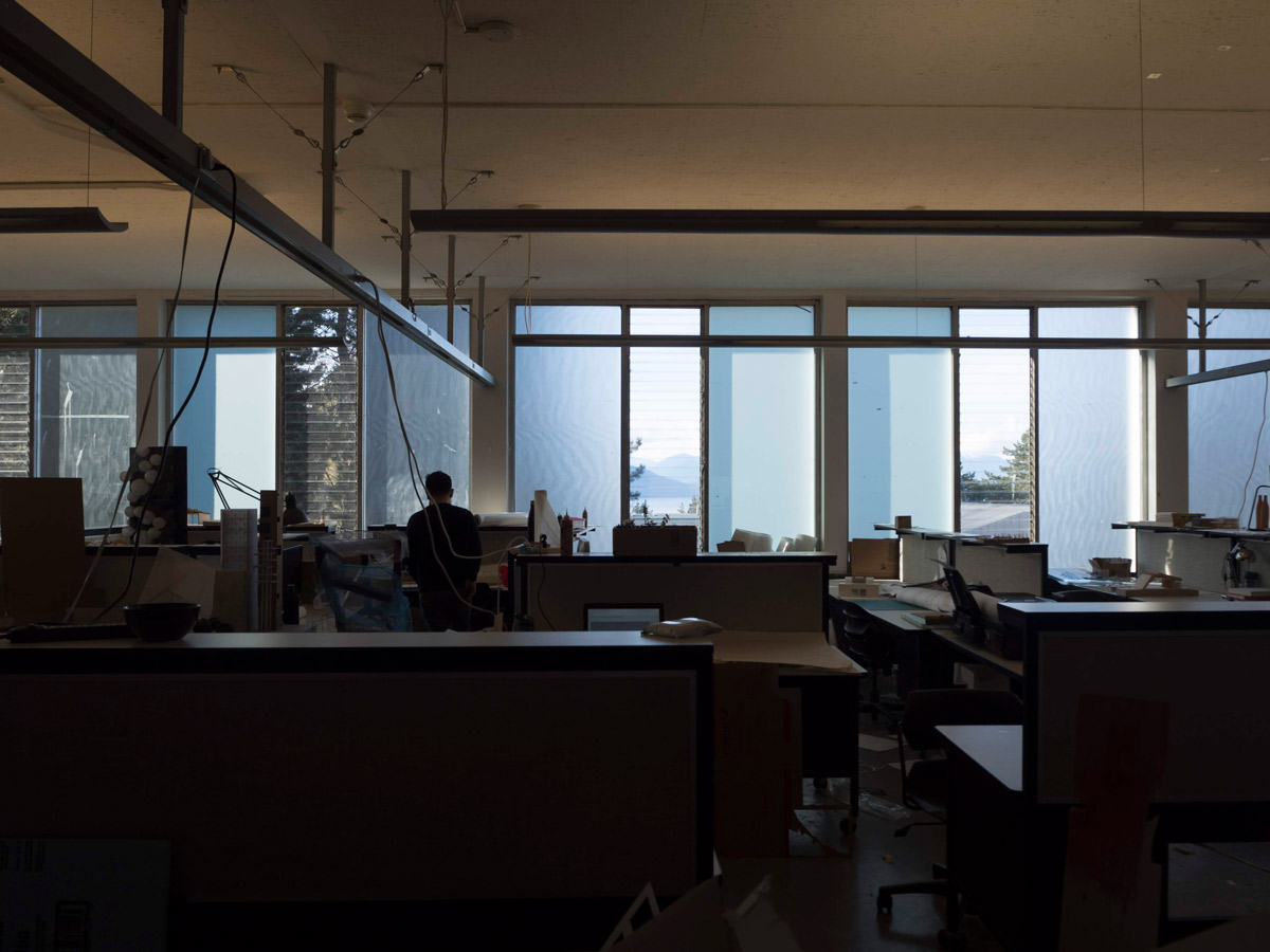 The studio on the third floor of the Lasserre Building, with the ocean and mountains visible out the window